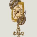 Collier steampunk SYBIL montre et grenat