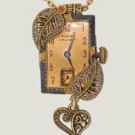 Collier steampunk VICTORINE montre et grenat