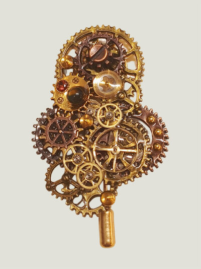 recto Broche Steampunk composée d'engrenages en alliage bronze Ornée d'un Grenat véritable et d'une agate de feu marron.