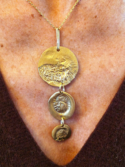 Collier ORACLE laiton réticulé